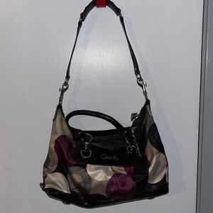 Authentic Coach bag. Leather detail with multi colored cloth. Black/Plum/Cream